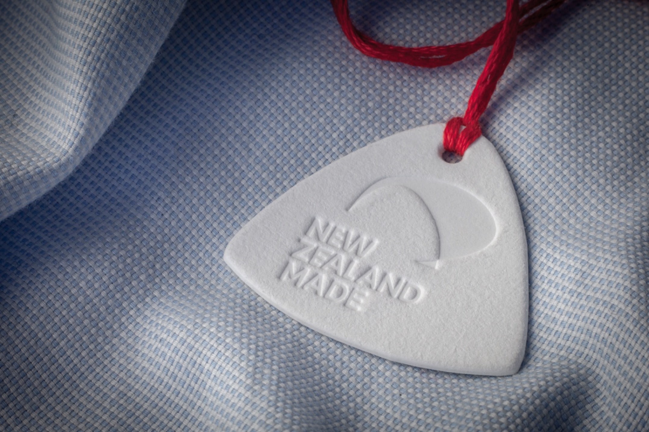 Custom printed hang tags Wellington — eco-friendly product branding NZ