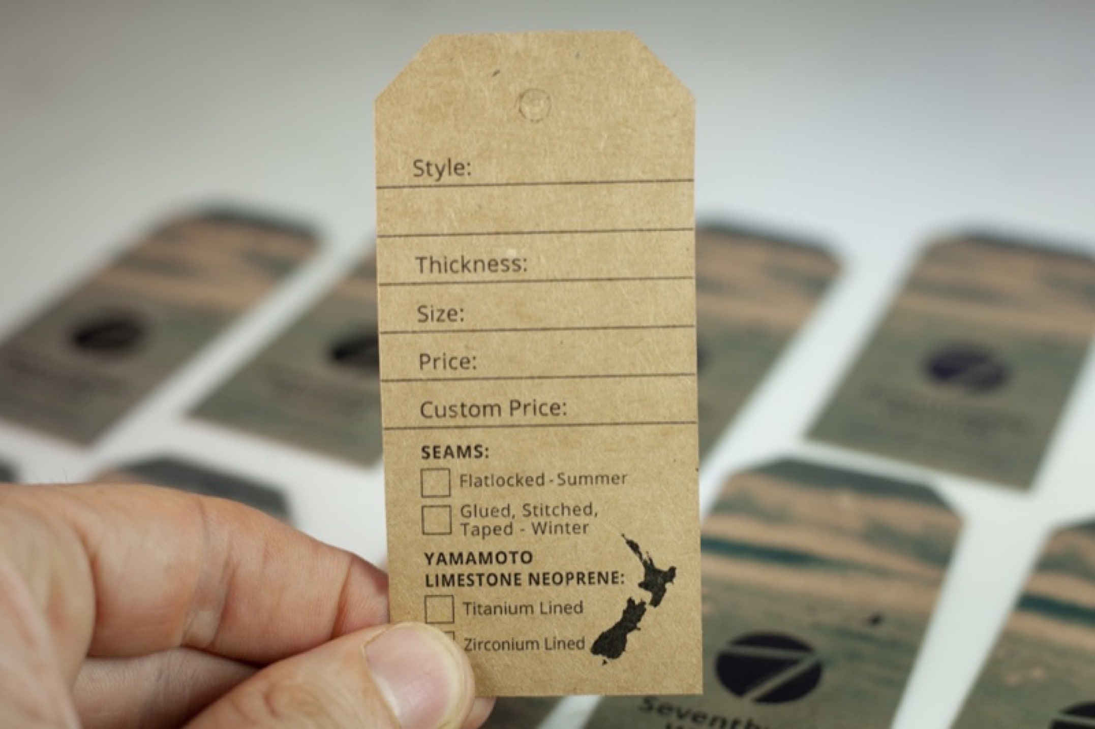 Printing wetsuit hang tags for Seventhwave Wetsuits